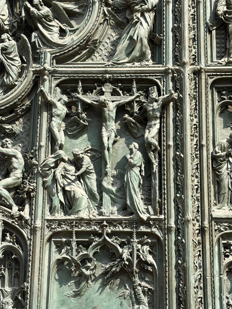 On the door into the Duomo