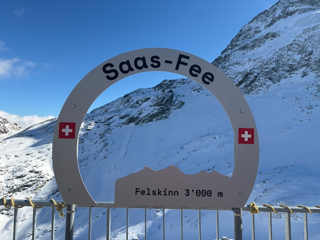 Saas-Fee sign at the snowy Felskinn viewpoint