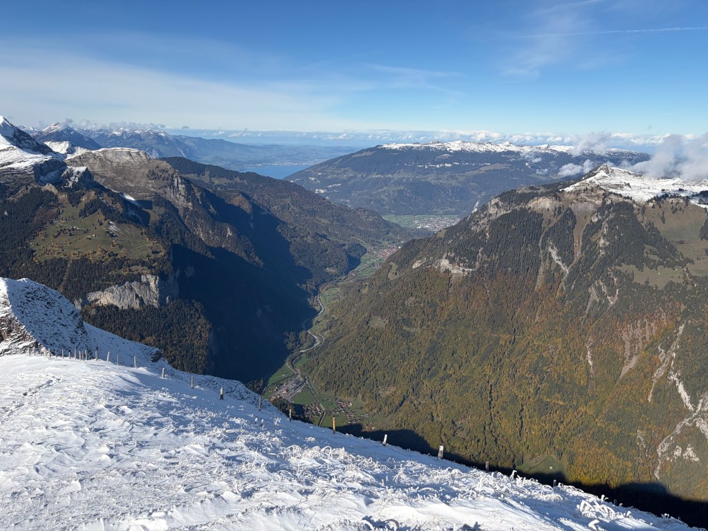 Long mountain valley seen from a snowy viewpoint near Wengen.